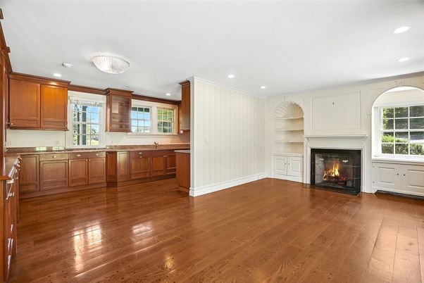 Empty room, Fireplace, Interior, Kitchen, Recessed Lighting, Wood Texture Flooring