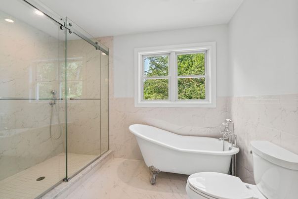 Bathroom, Free Standing Baths, Glass Shower, Interior, Marble, Marble Walls, Recessed Lighting