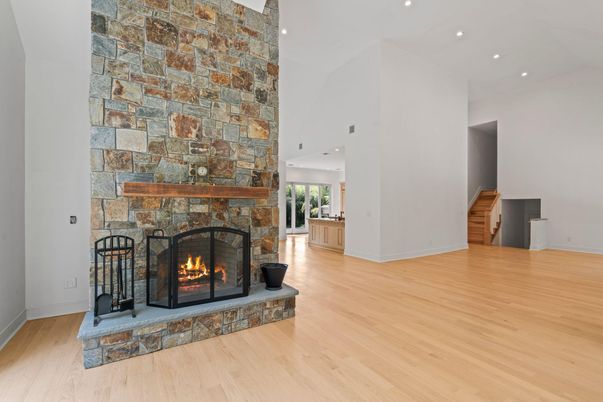 Fireplace, Interior, Recessed Lighting, Stone Walls, Wood Texture Flooring