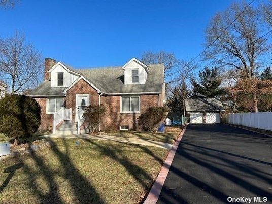 Exterior, Facade, Brick Facade, Cape Cod
