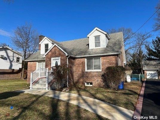 Exterior, Facade, Brick Facade, Cape Cod
