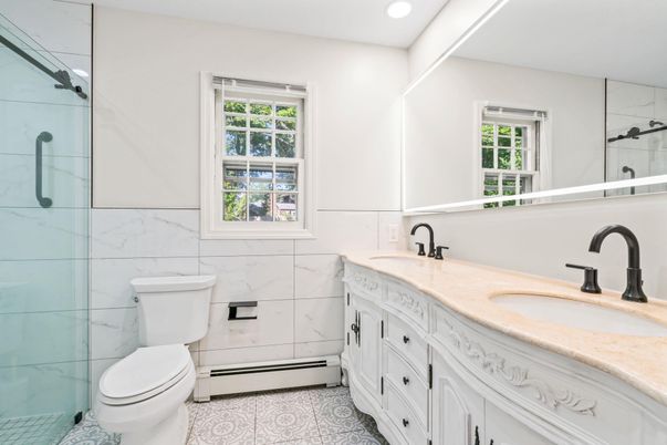 Bathroom, Dual Sink Vanities, Glass Shower, Interior, Marble Walls, Recessed Lighting
