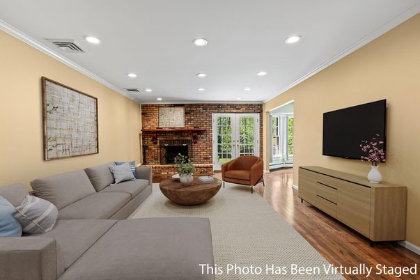 Fireplace, Interior, Living room, Recessed Lighting, Stone Walls, Wood Texture Flooring