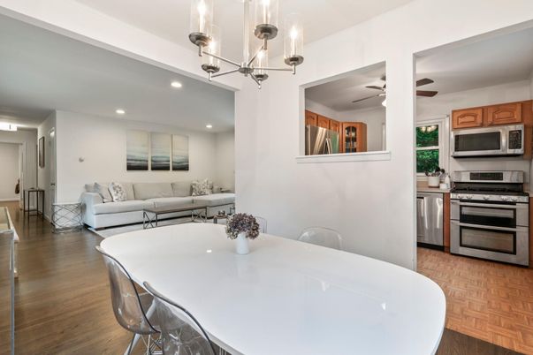Chandelier, Dining room, Interior, Kitchen, Living room, Recessed Lighting, Stainless Steel Appliances, Wood Texture Flooring