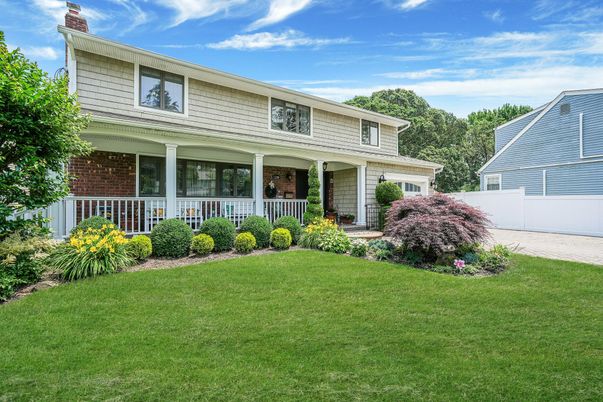 Attached, Exterior, Facade, Brick Facade, American Foursquare