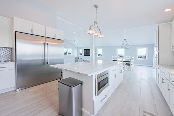 Dining room, Interior, Kitchen, Pendant Lights, Recessed Lighting, Stainless Steel Appliances, Wood Texture Flooring