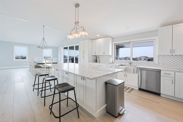 Dining room, Interior, Kitchen, Pendant Lights, Recessed Lighting, Stainless Steel Appliances, Wood Texture Flooring