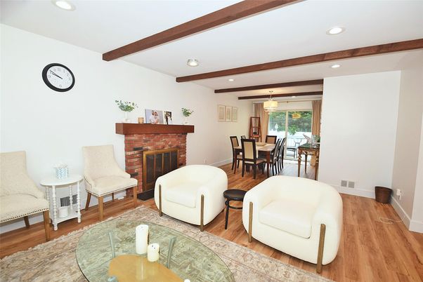 Dining room, Fireplace, Interior, Pendant Lights, Recessed Lighting, Wooden Beams, Wood Texture Flooring