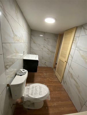 Bathroom, Interior, Marble Walls, Recessed Lighting, Wood Texture Flooring
