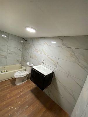 Bathroom, Interior, Marble Walls, Recessed Lighting, Wood Texture Flooring