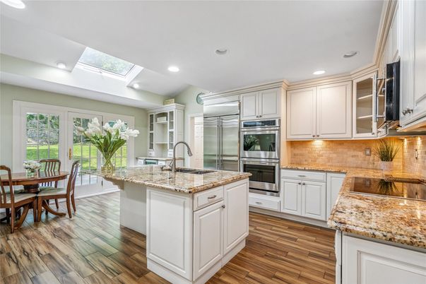 Dining room, Interior, Kitchen, Recessed Lighting, Stainless Steel Appliances, Wood Texture Flooring