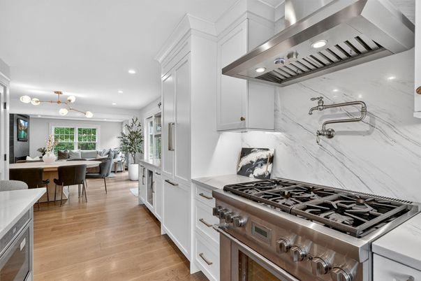 Dining room, Interior, Kitchen, Marble Walls, Recessed Lighting, Stainless Steel Appliances, Wood Texture Flooring
