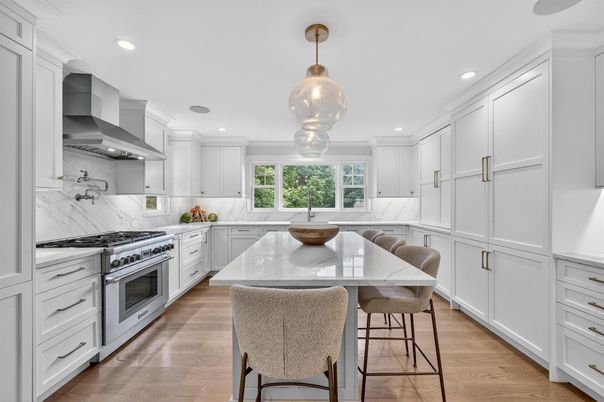 Interior, Kitchen, Marble Walls, Pendant Lights, Recessed Lighting, Stainless Steel Appliances, Wood Texture Flooring