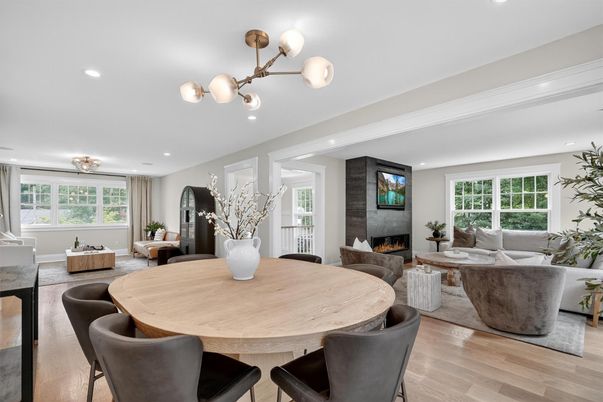 Dining room, Fireplace, Interior, Living room, Recessed Lighting, Wood Texture Flooring