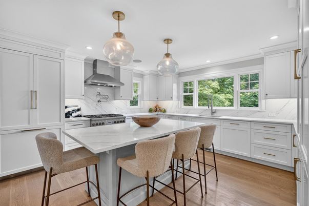 Interior, Kitchen, Marble Walls, Pendant Lights, Recessed Lighting, Stainless Steel Appliances, Wood Texture Flooring