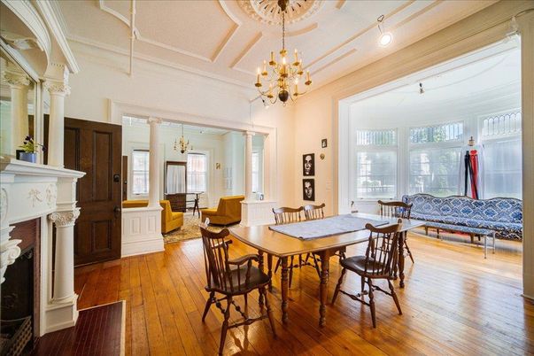 Chandelier, Dining room, Fireplace, Interior, Living room, Pendant Lights, Wood Texture Flooring