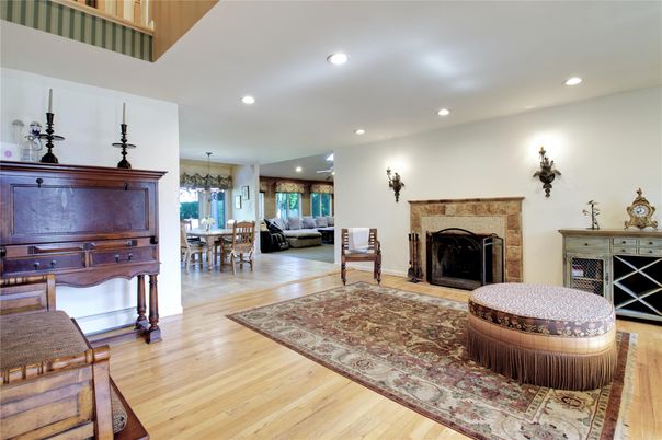 Chandelier, Dining room, Fireplace, Interior, Piano, Recessed Lighting, Wood Texture Flooring