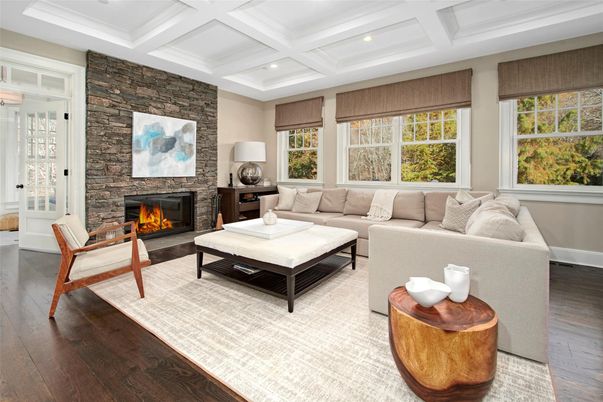 Fireplace, Interior, Living room, Recessed Lighting, Stone Walls, Wood Texture Flooring