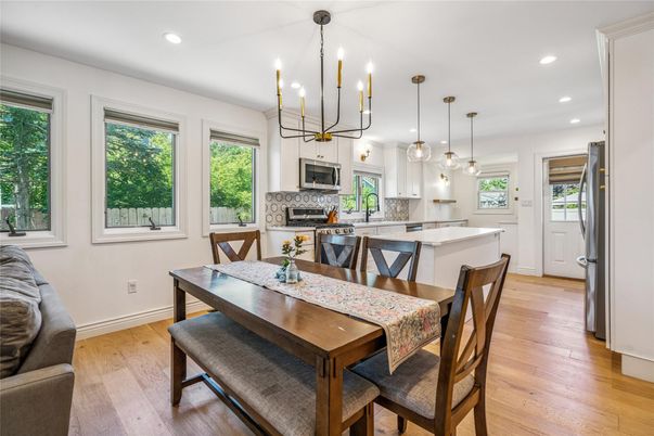 Dining room, Fireplace, Interior, Kitchen, Pendant Lights, Recessed Lighting, Wood Texture Flooring