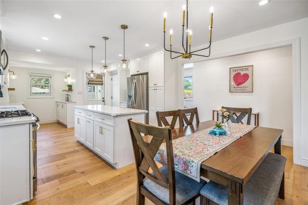 Dining room, Interior, Kitchen, Pendant Lights, Recessed Lighting, Stainless Steel Appliances, Wood Texture Flooring