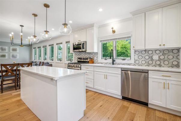 Dining room, Interior, Kitchen, Pendant Lights, Recessed Lighting, Stainless Steel Appliances, Wood Texture Flooring