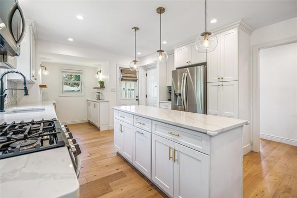 Interior, Kitchen, Pendant Lights, Recessed Lighting, Stainless Steel Appliances, Wood Texture Flooring