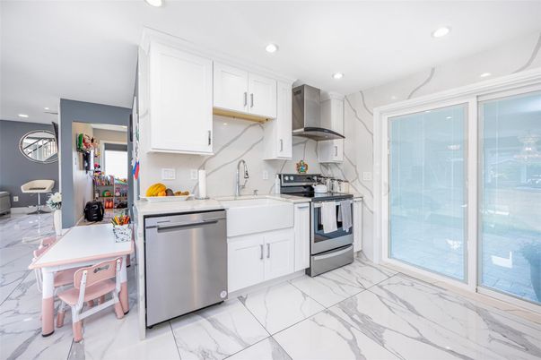 Interior, Kitchen, Marble, Marble Walls, Recessed Lighting, Stainless Steel Appliances