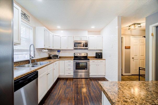 Interior, Kitchen, Recessed Lighting, Stainless Steel Appliances, Wood Texture Flooring