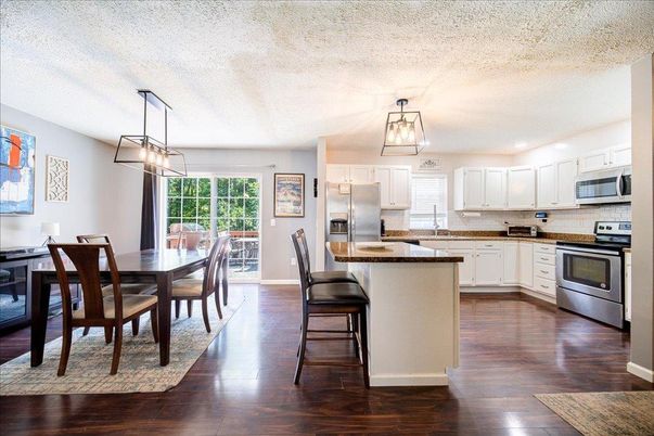 Dining room, Interior, Kitchen, Pendant Lights, Stainless Steel Appliances, Wood Texture Flooring