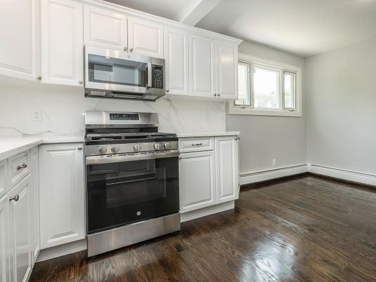 Interior, Kitchen, Marble Walls, Stainless Steel Appliances, Wood Texture Flooring
