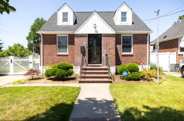 Exterior, Facade, Brick Facade, Cape Cod