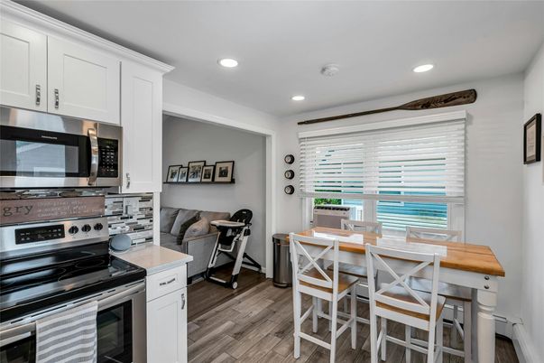 Interior, Kitchen, Recessed Lighting, Stainless Steel Appliances, Water, Wood Texture Flooring