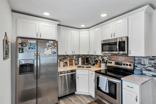 Interior, Kitchen, Recessed Lighting, Stainless Steel Appliances, Wood Texture Flooring