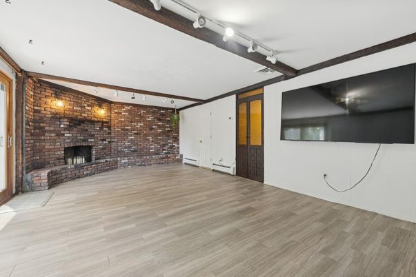 Empty room, Fireplace, Interior, Stone Walls, Wood Texture Flooring