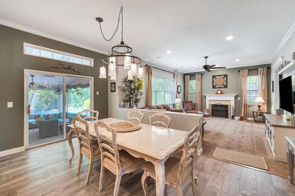 Dining room, Fireplace, Interior, Living room, Pendant Lights, Recessed Lighting, Wood Texture Flooring
