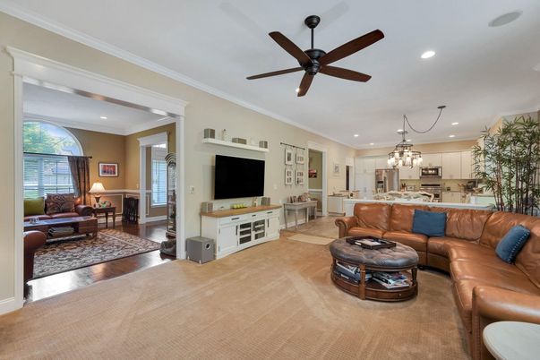 Chandelier, Interior, Kitchen, Living room, Pendant Lights, Recessed Lighting, Stainless Steel Appliances, Wood Texture Flooring