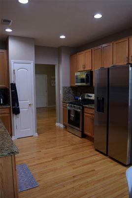 Interior, Kitchen, Recessed Lighting, Stainless Steel Appliances, Wood Texture Flooring