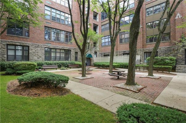 Backyard, Exterior, Facade, Brick Facade, Condo Building