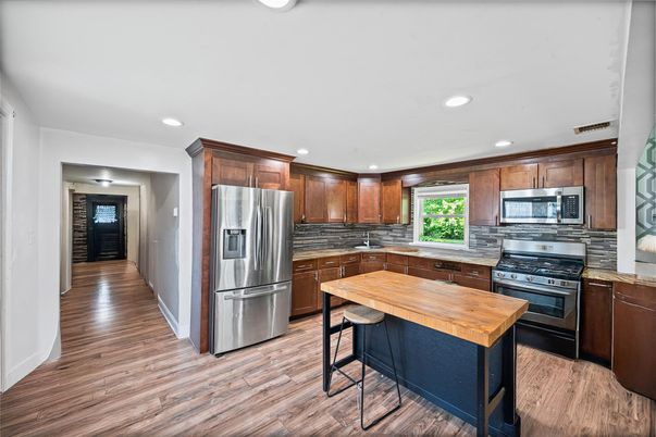 Interior, Kitchen, Recessed Lighting, Stainless Steel Appliances, Wood Texture Flooring