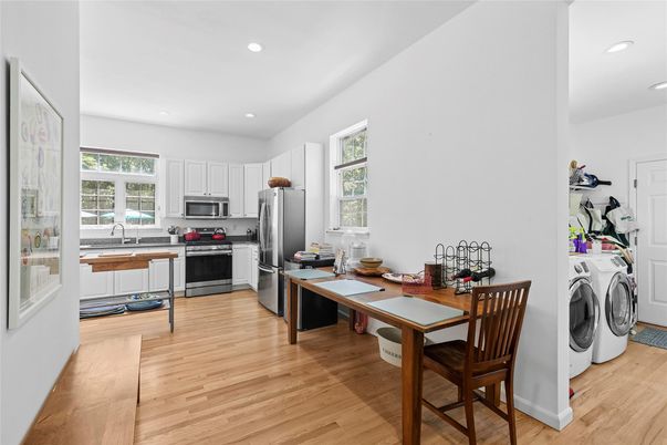 Interior, Kitchen, Recessed Lighting, Stainless Steel Appliances, Washer, Wood Texture Flooring