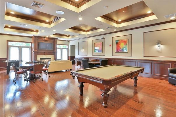 Billiard Table, Dining room, Fireplace, Game Room, Interior, Living room, Recessed Lighting, Wood Texture Flooring