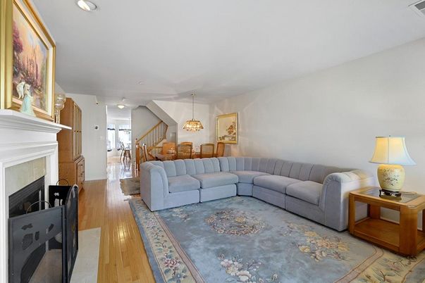 Dining room, Fireplace, Interior, Living room, Pendant Lights, Recessed Lighting, Wood Texture Flooring