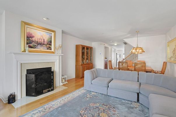 Dining room, Fireplace, Interior, Living room, Pendant Lights, Recessed Lighting, Wood Texture Flooring