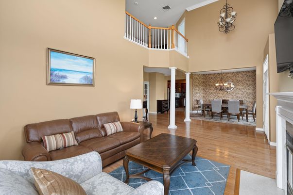 Chandelier, Dining room, Fireplace, Interior, Living room, Recessed Lighting, Wood Texture Flooring