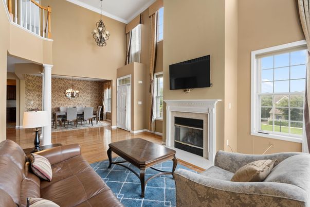 Chandelier, Dining room, Fireplace, Interior, Living room, Pendant Lights, Wood Texture Flooring