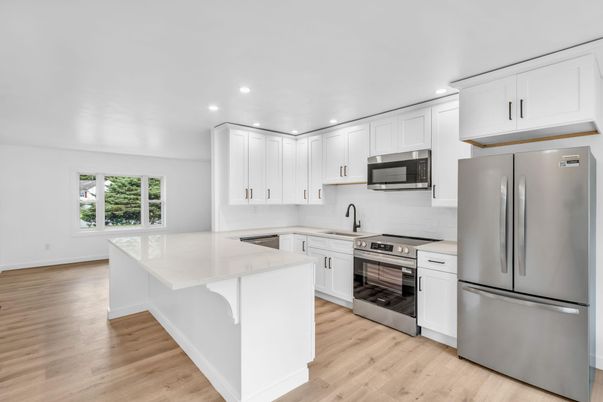 Interior, Kitchen, Recessed Lighting, Stainless Steel Appliances, Wood Texture Flooring