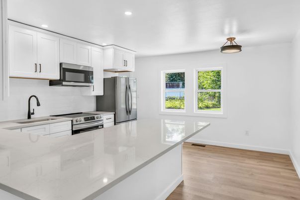 Interior, Kitchen, Recessed Lighting, Stainless Steel Appliances, Wood Texture Flooring