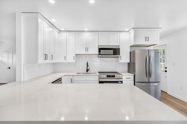 Interior, Kitchen, Recessed Lighting, Stainless Steel Appliances, Wood Texture Flooring