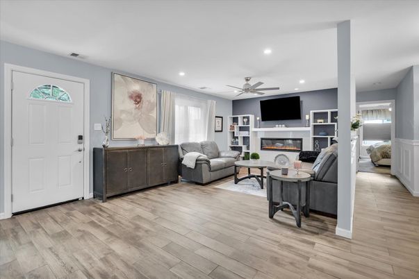 Fireplace, Interior, Living room, Recessed Lighting, Wood Texture Flooring