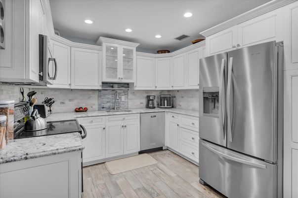 Interior, Kitchen, Recessed Lighting, Stainless Steel Appliances, Wood Texture Flooring
